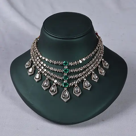 Polki Diamond Four-Layer Choker Necklace with Emerald Accents and Kite DropsPolki Diamond Four-Layer Choker Necklace with Emerald Accents and Kite Drops