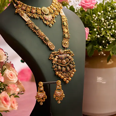 gold necklace and pendant set